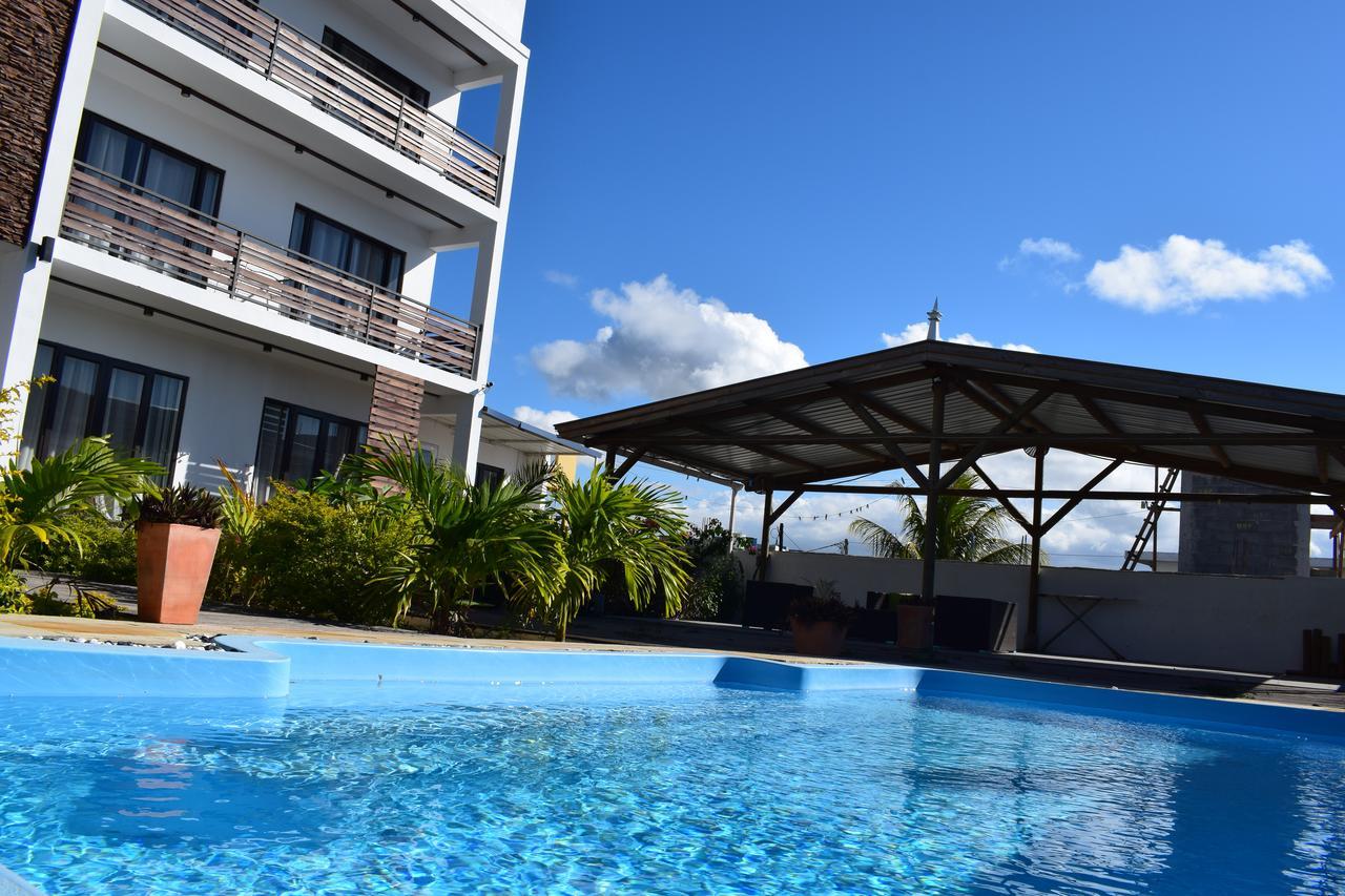 Roi Holiday Stay Гранд Байе Стая снимка
